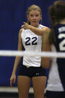 Senior libero Tait Johnson and the Dolphins lost to their beach rivals in five games Monday at the PaliHi gym.